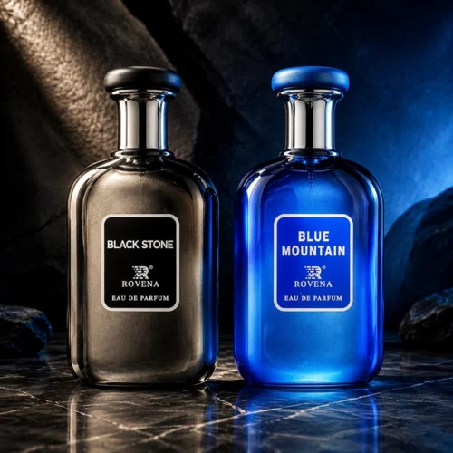 نمای هنری از ست ادکلن Rovena Black Stone و Blue Mountain جلوی صخره‌های سنگی با نور آبی.