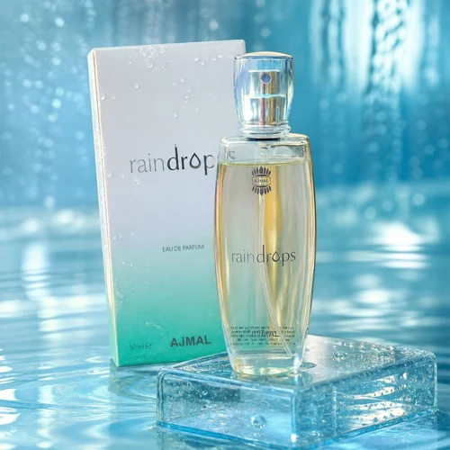 عطر اجمل رین‌دراپس زنانه 50 میلی‌لیتر با رایحه گلی میوه‌ای در فضایی آبی و قطرات آب